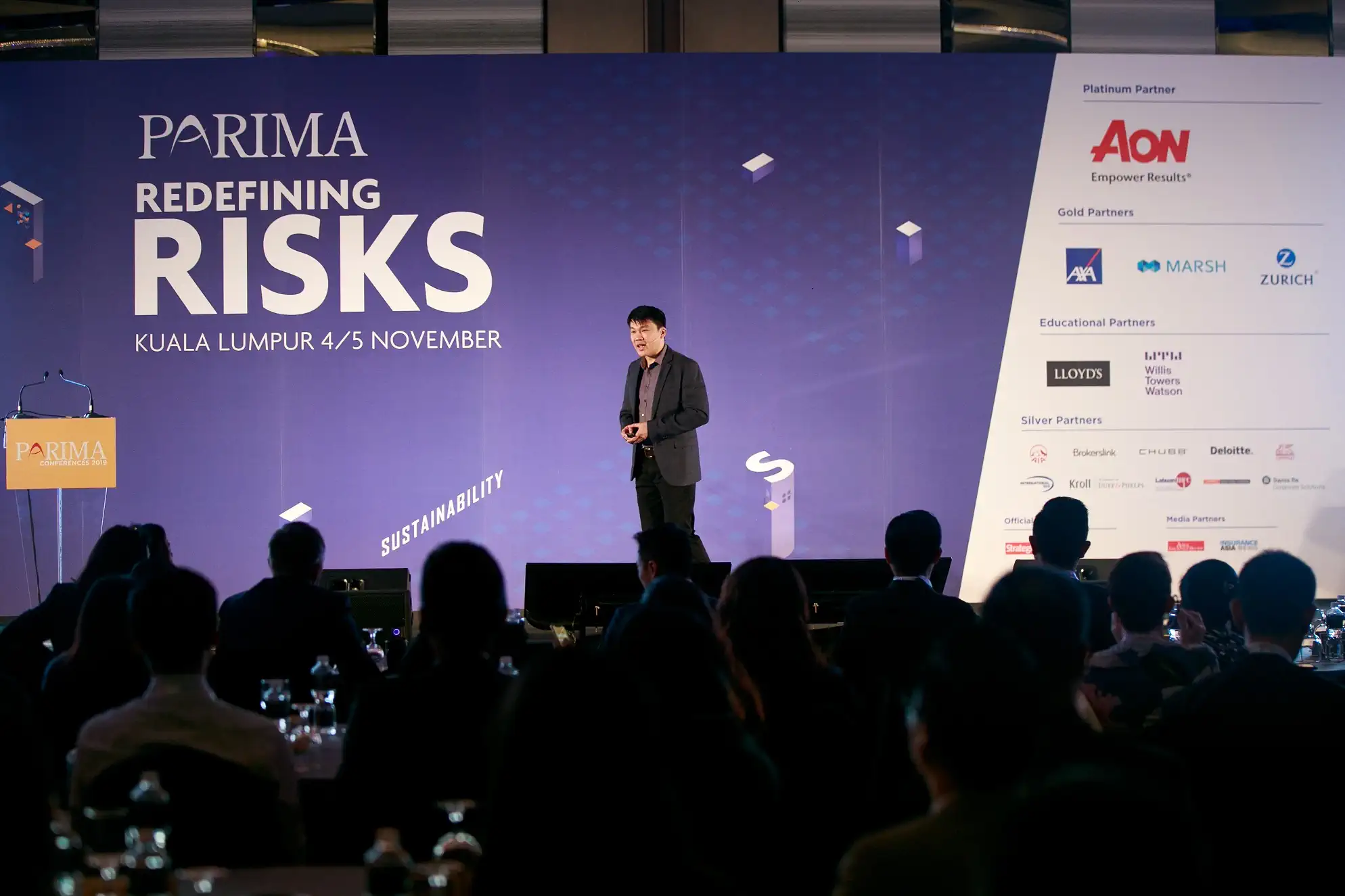 Charlie Ang speaking at PARIMA Redefining Risks conference